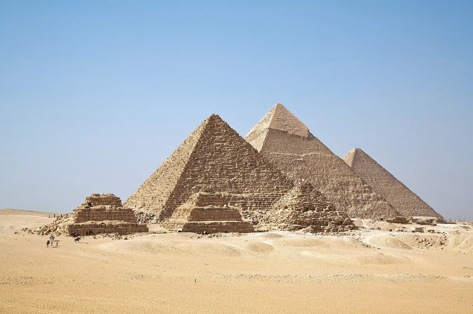 The Pyramids of Giza under a clear blue sky