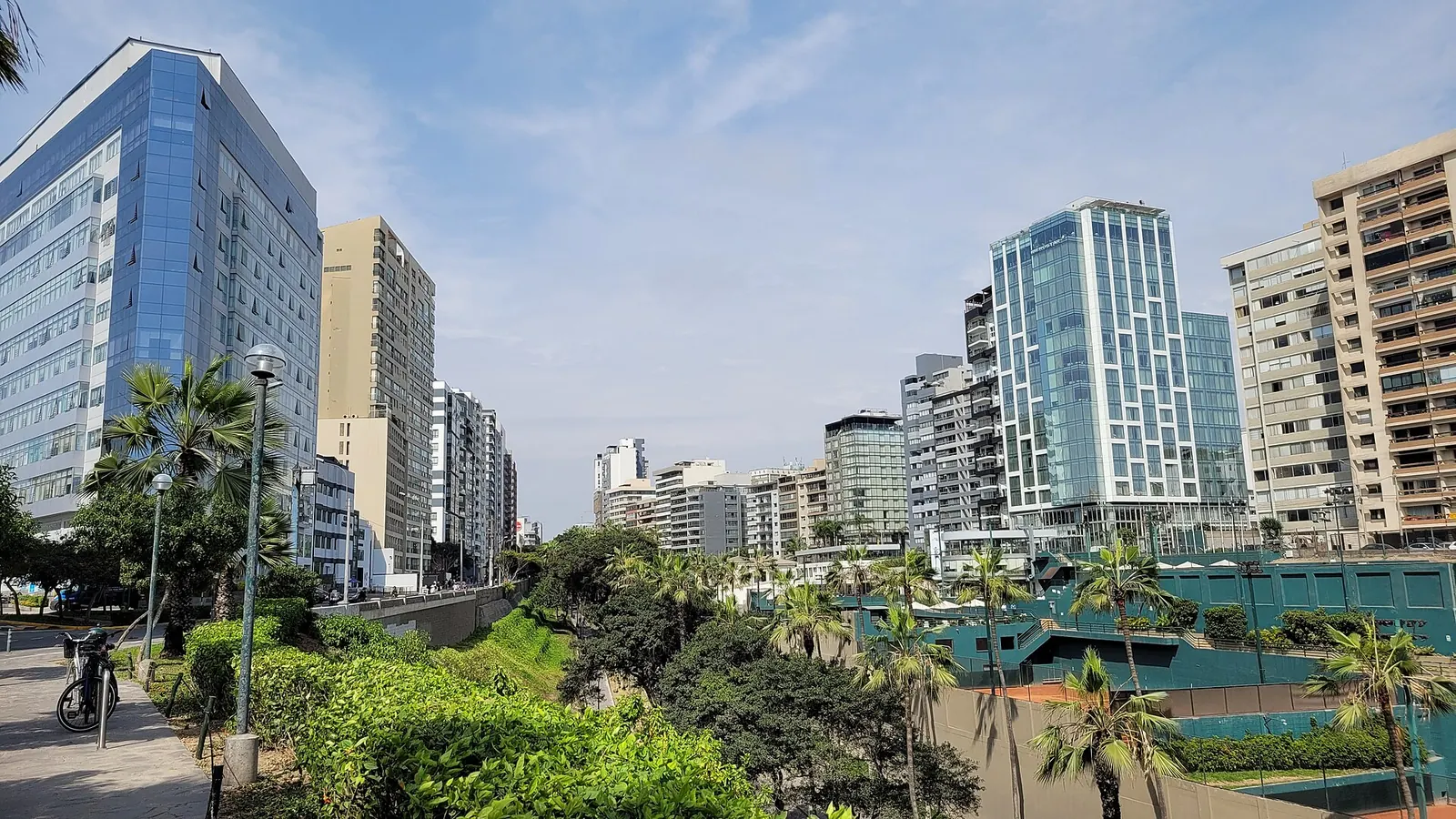 Modern towers and palm-lined parks along the clifftops of Miraflores, Lima