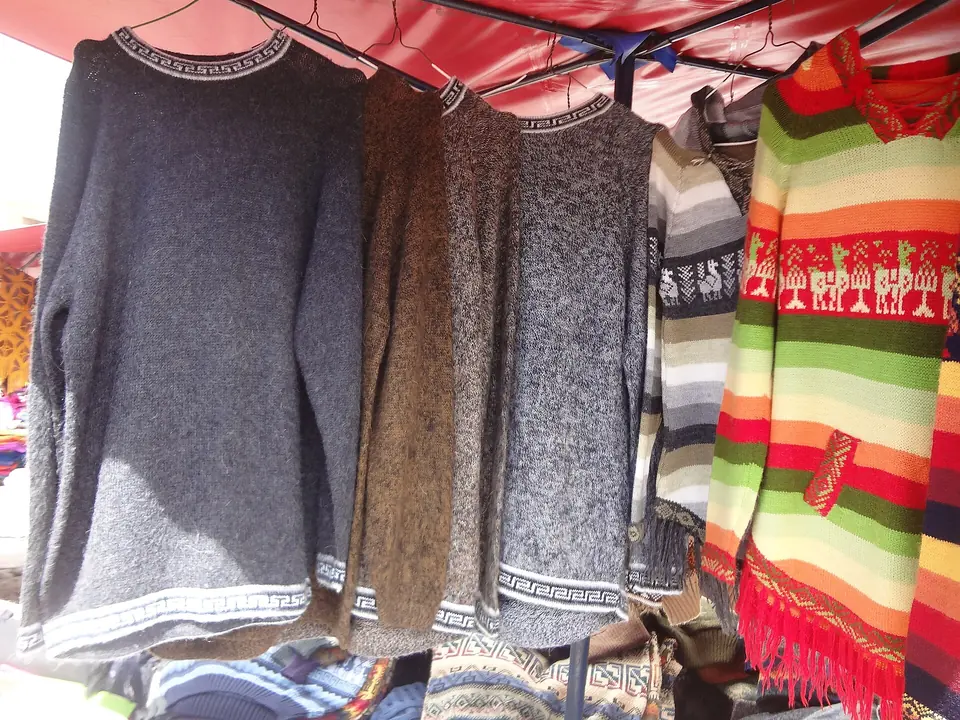 Hand Made Alpaca Sweaters for sale at the Otavalo Artisan Market in the Andes Mountains, South America