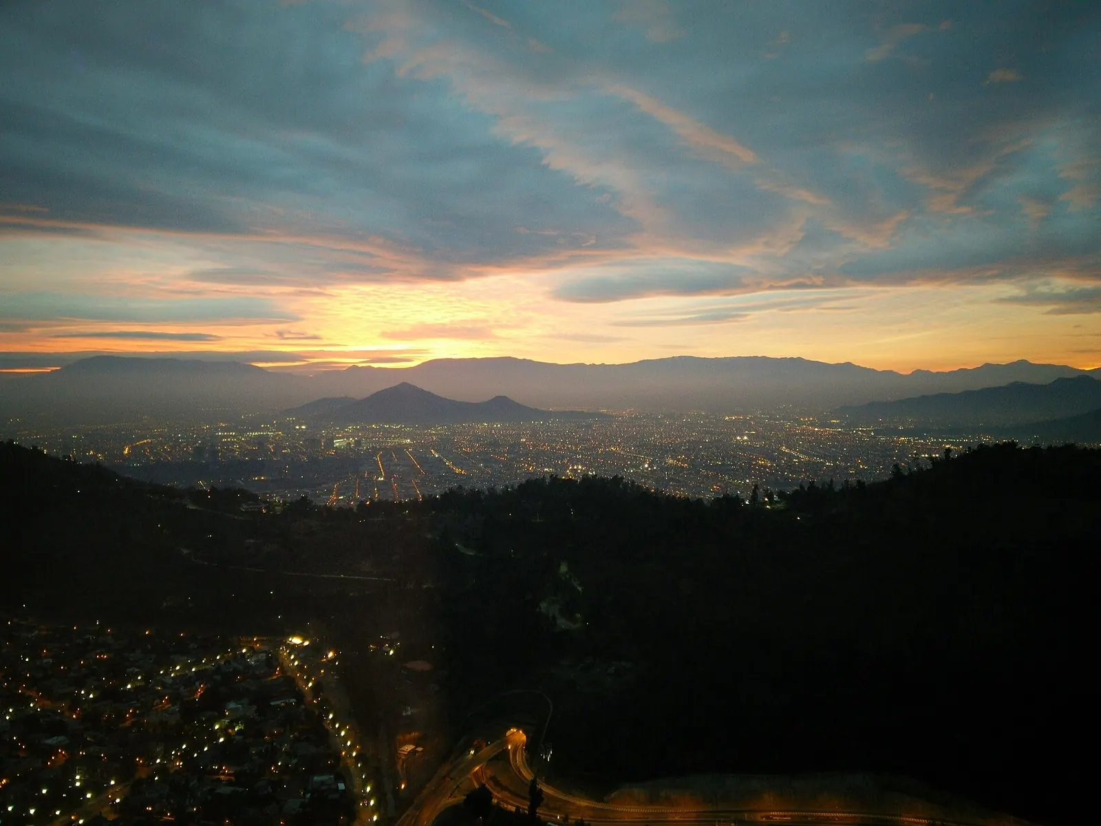 Santiago de Chile at sunset with the Andes on the horizon