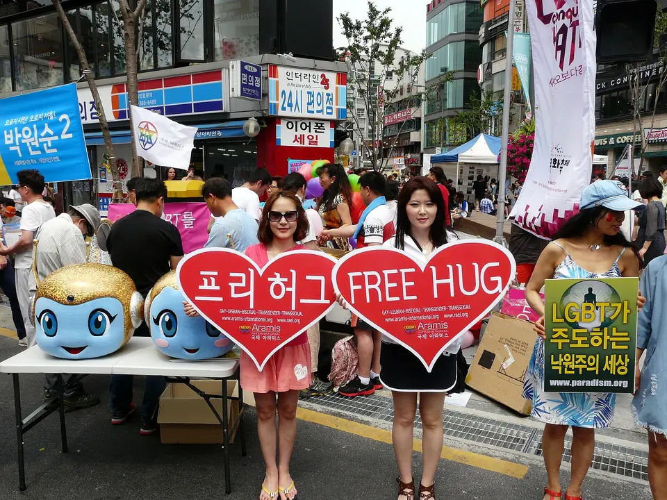w:Korea Queer Culture Festival 2014, before the parade. Here: several participants at a small booth